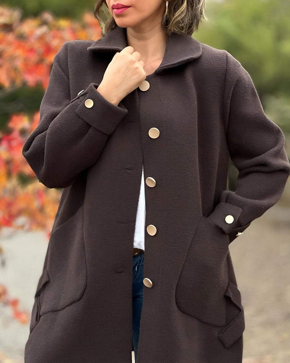 Chic women's autumn/spring jacket with unique side knot detail. Elegant lightweight outerwear.