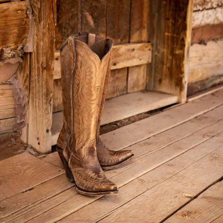 Chic women's patterned knee-high boots with a pointed toe & zip, ideal for elegant autumn/winter outfits.