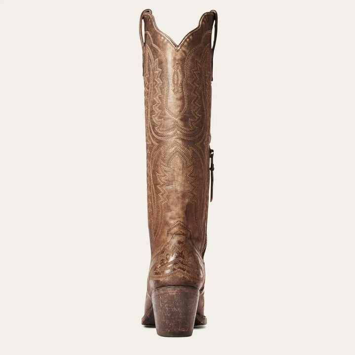 Pair these patterned zipped tall boots with any outfit for a chic, pointed-toe look and elegant style.