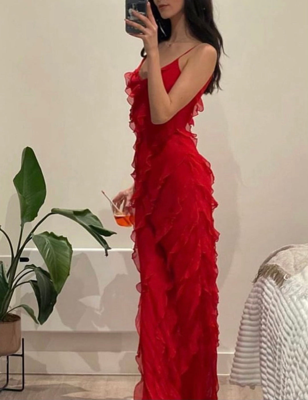 Elegant women's ruffled maxi dress, great for casual chic or formal occasion styling.