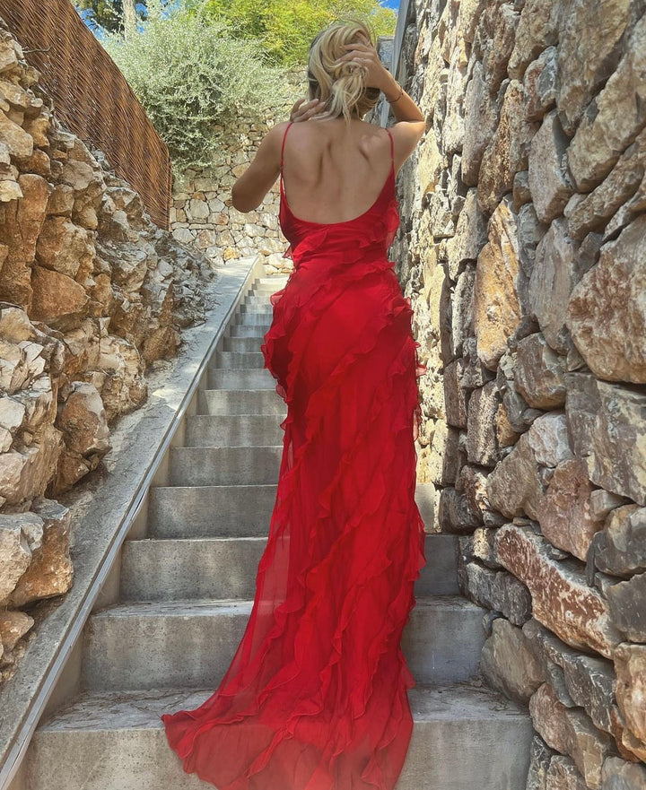 Flowy elegant ruffled maxi dress, perfect for summer celebrations and special occasions.
