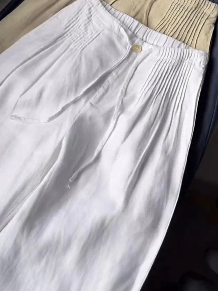 Flowy wide-leg trousers for women, versatile comfort & effortless style for any occasion.