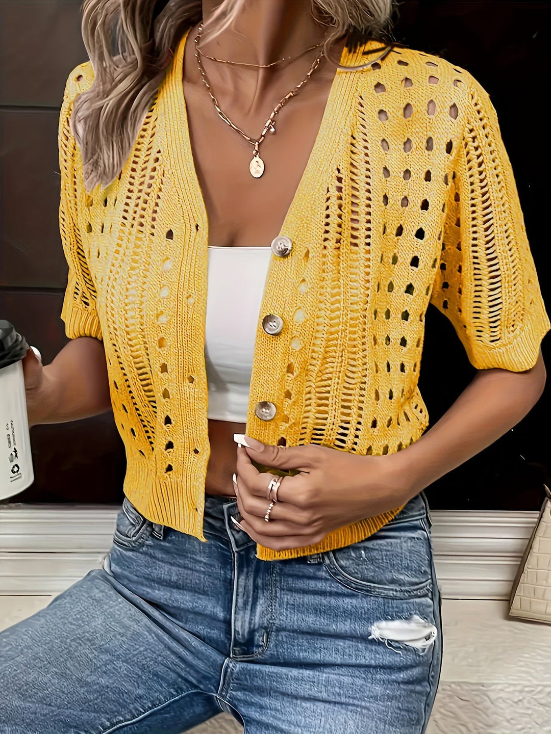 Comfortable women's short sleeve summer cardigan, an elegant, open-front top for chic layering.