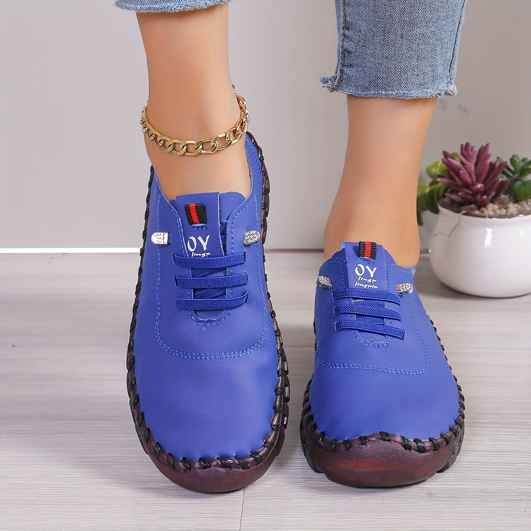 Back view of women's comfortable round toe shoes, emphasizing their simple, elegant design.