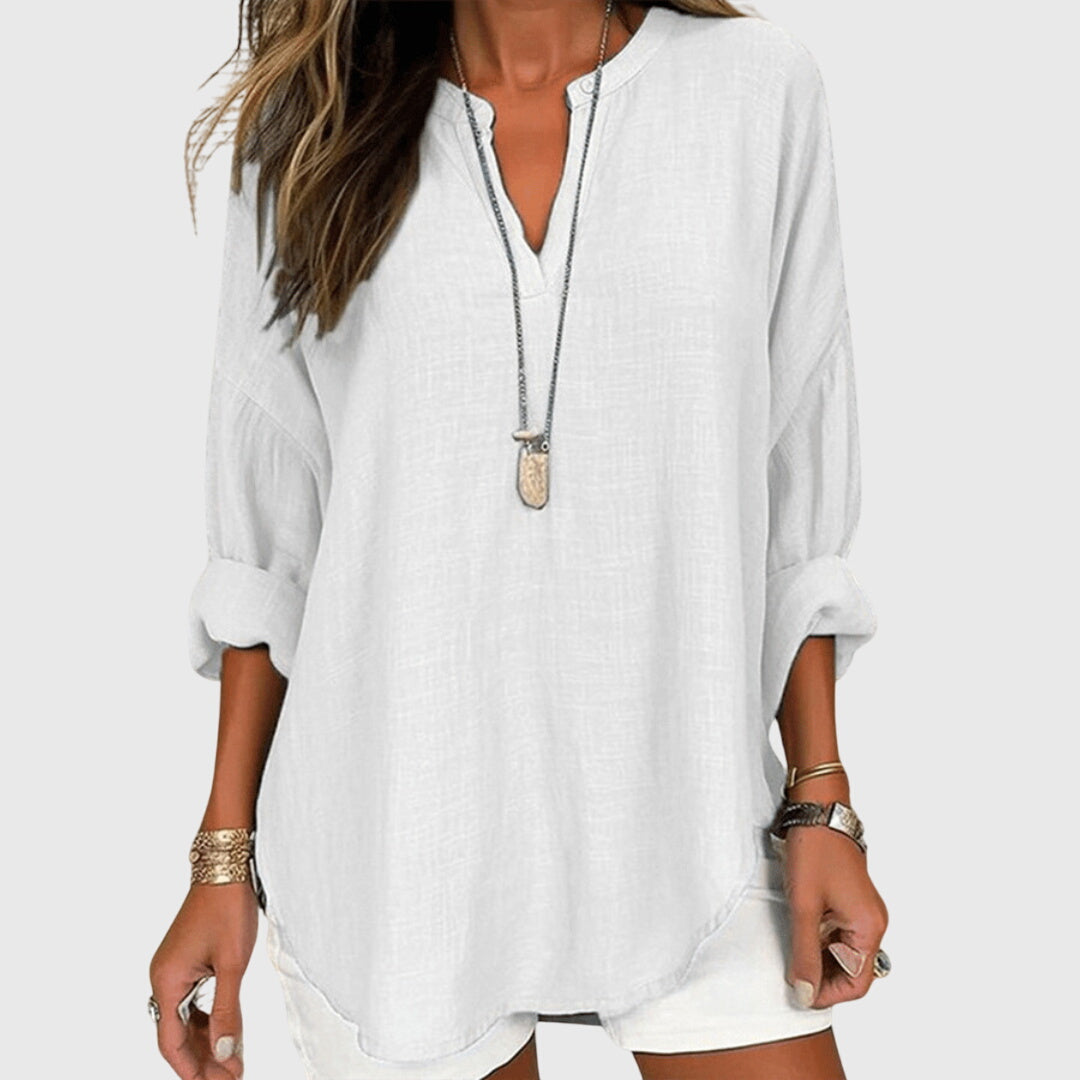 Lightweight long sleeve beach top for women, ideal for resort wear and summer vacation outfits.