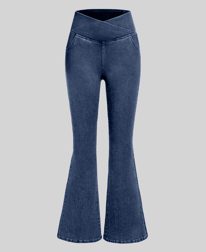 Versatile dark blue high-waist stretch jeans for women, a comfortable slim fit denim bottom.