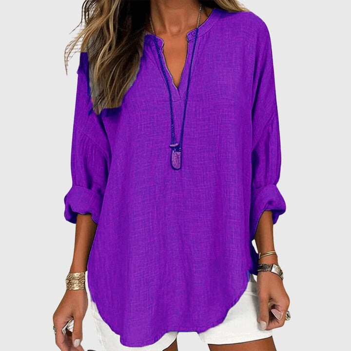 Lightweight women's vacation blouse, a casual and chic flowing shirt for sunny beach days.