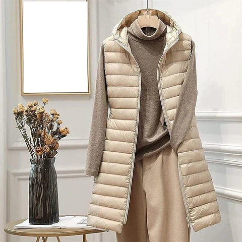 Elegant women's long sleeveless jacket. Chic versatile layering vest, perfect for all-season fashion.