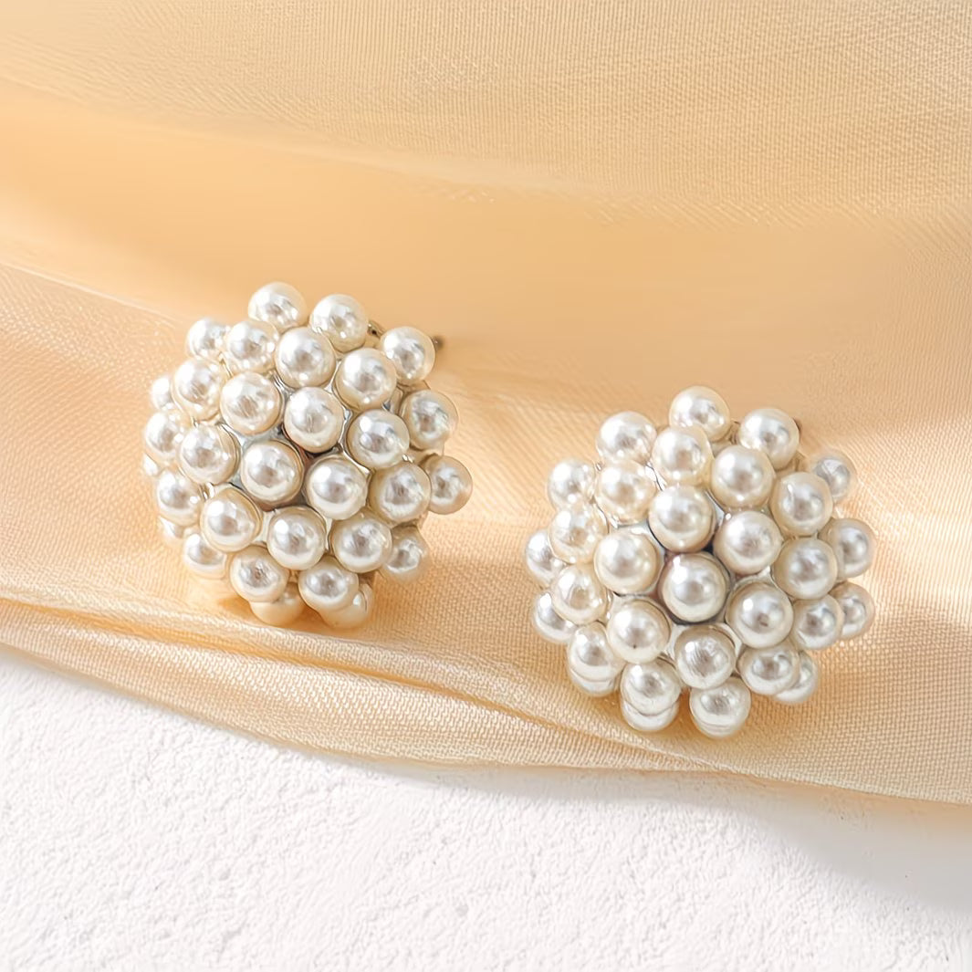 Classic women's pearl dome stud earrings. Chic and elegant fashion accessory, ideal for any occasion.
