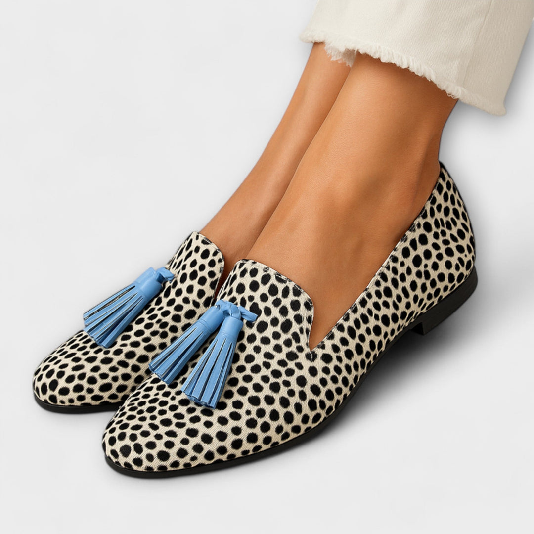 Stylish women's polka dot tassel loafers, comfortable slip-on shoes perfect for casual everyday wear.