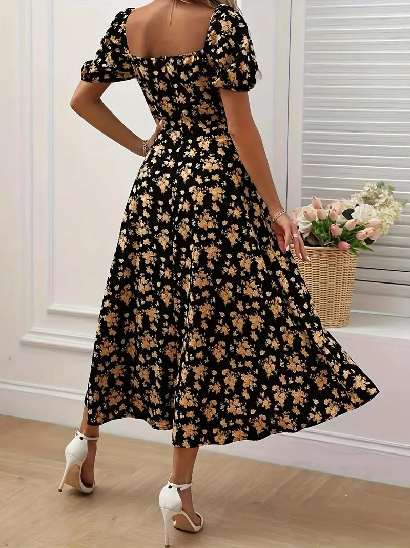 Vibrant floral A-line midi dress for women, featuring chic puff sleeves & a relaxed summer fit.