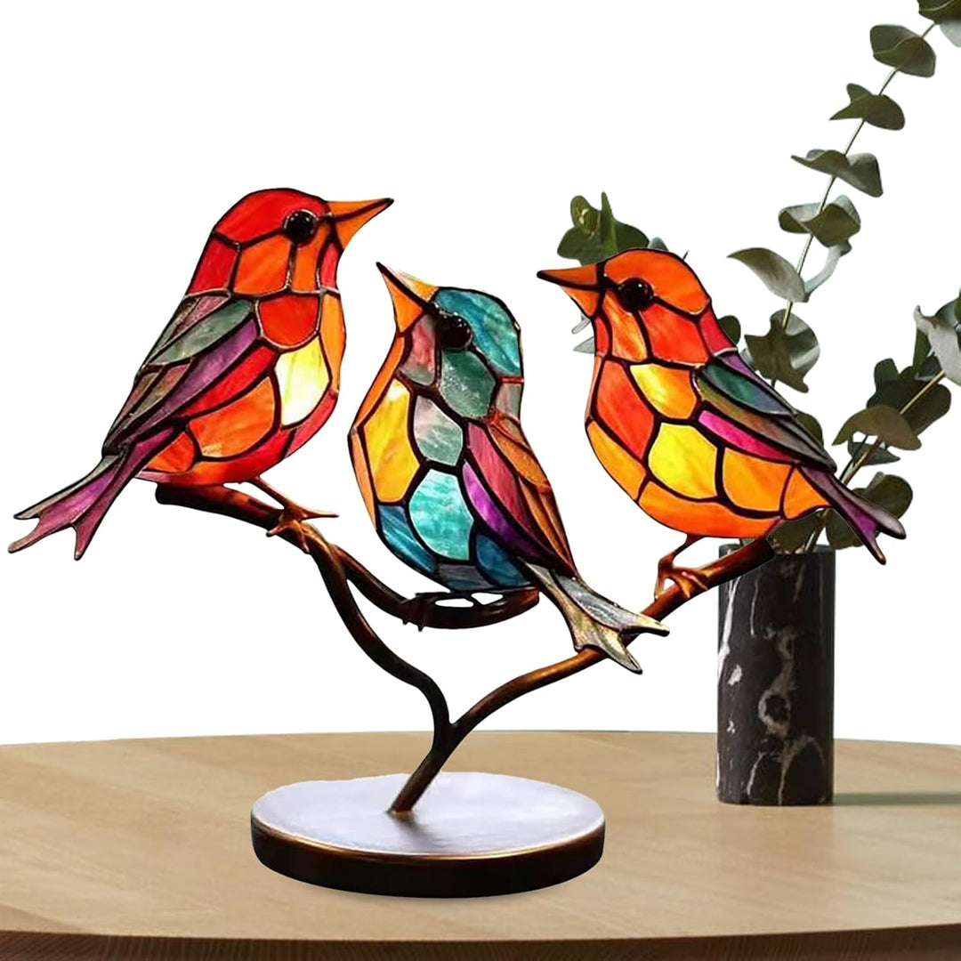 Elegant modern bird art, decorative tabletop sculpture with coloured glass, a unique living room accent.