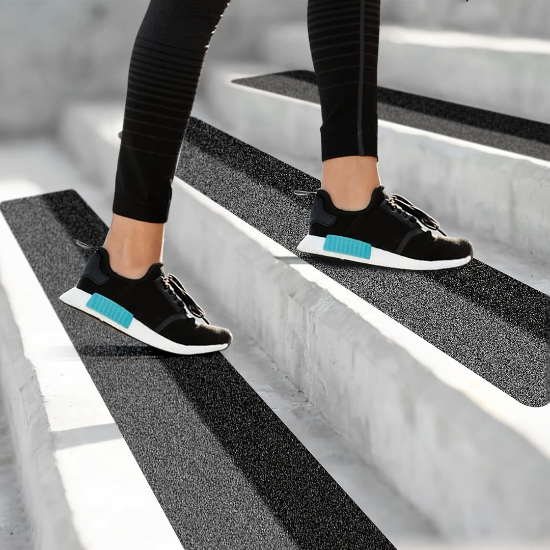Durable rubber anti-slip strips for outdoor & indoor stairs, ensuring safe tread & preventing slips.