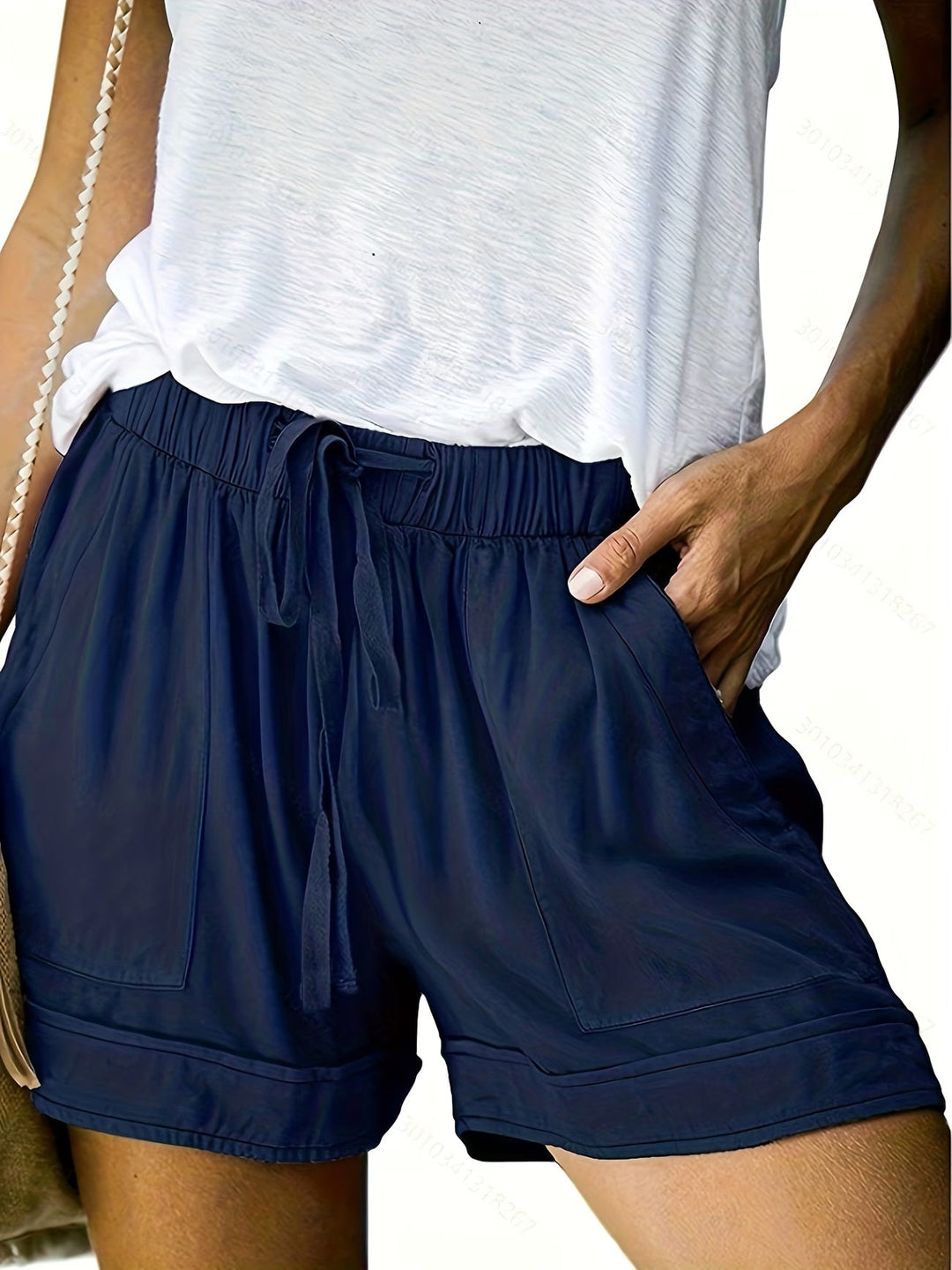 Chic women's loose summer shorts, offering breathable comfort & relaxed style for warm weather days.