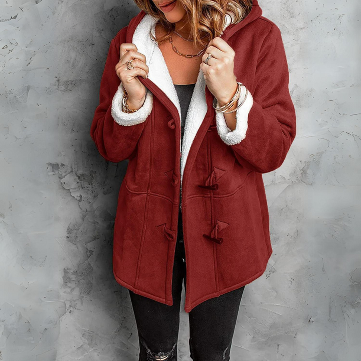 Women's stylish Aspen fleece toggle coat for winter. Cozy outerwear jacket, perfect for warmth & fashion.