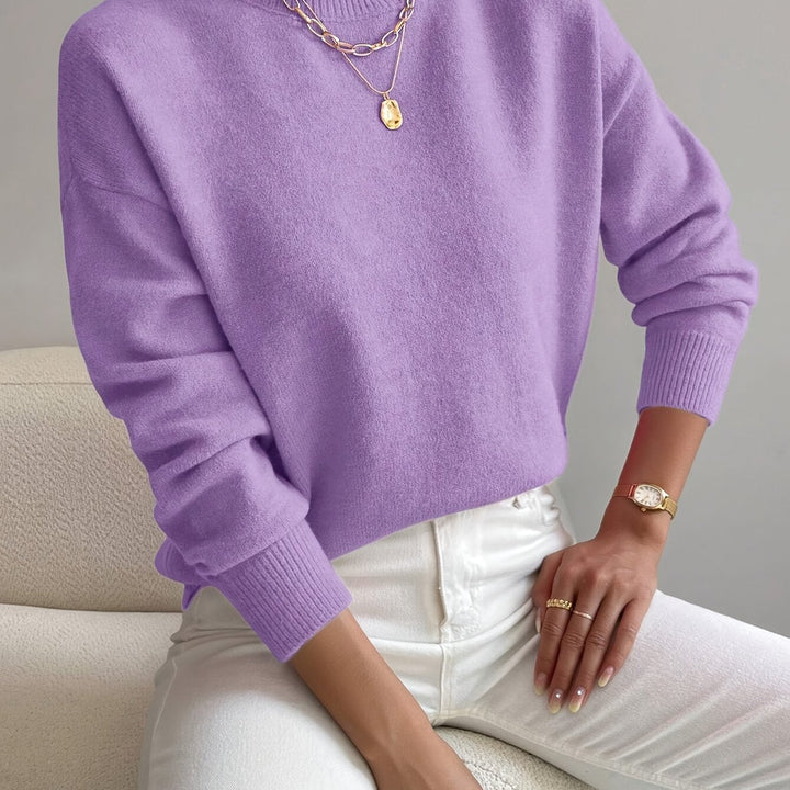 Ladies' long sleeve knitted high neck pullover, modern winter fashion.