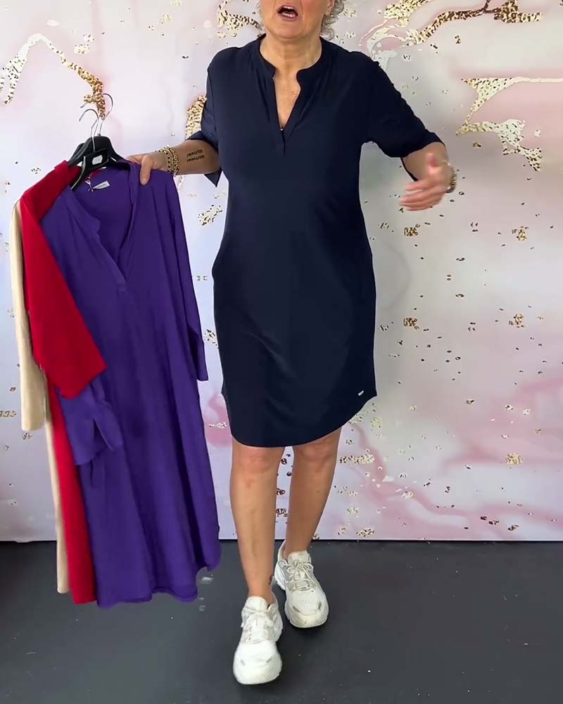 Sophisticated women's V-neck midi dress, blending elegance with effortless comfort for any occasion.