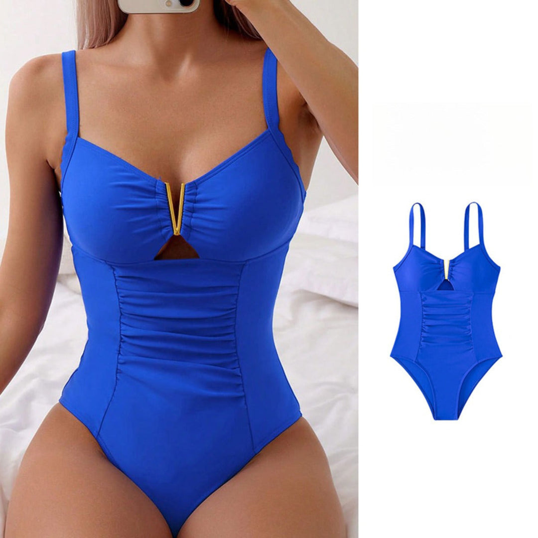 Women's slimming one-piece swimsuit, conservative modest bathing suit for beach & resort wear.