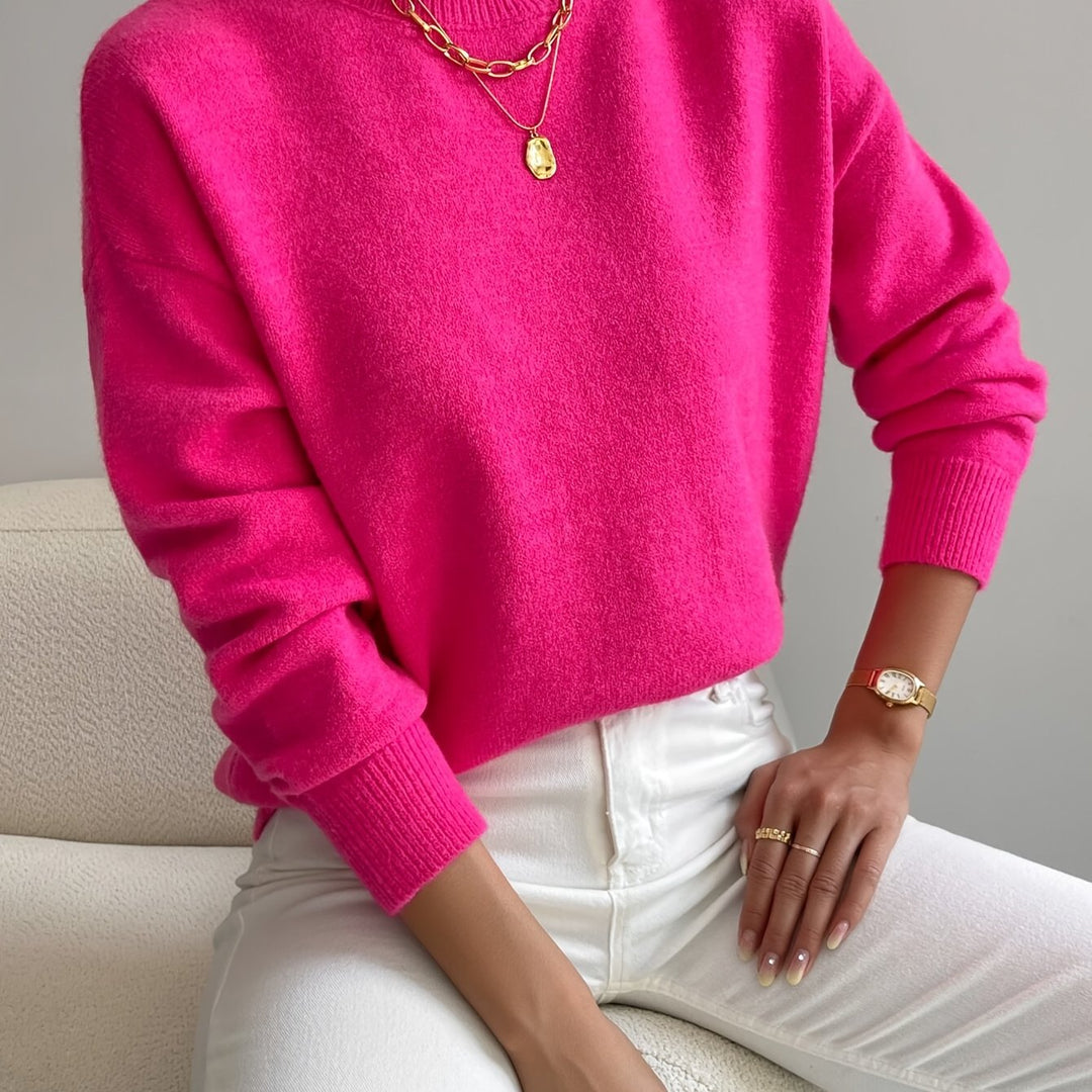 Ladies' cozy knit high neck sweater, ideal for chilly autumn days.