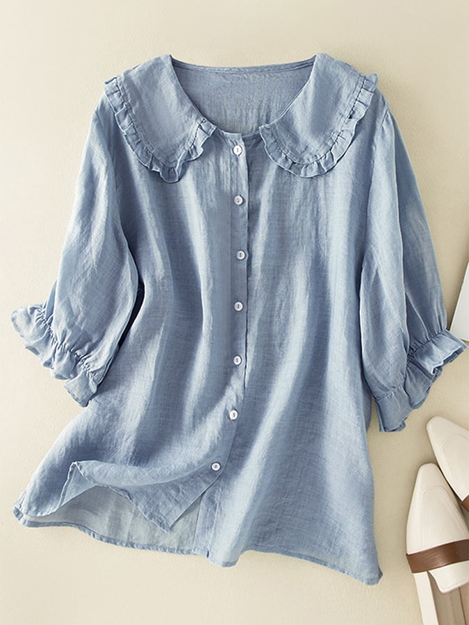 Women's stylish loose fit ruffled neck blouse in a versatile design, perfect for casual or elegant everyday wear.