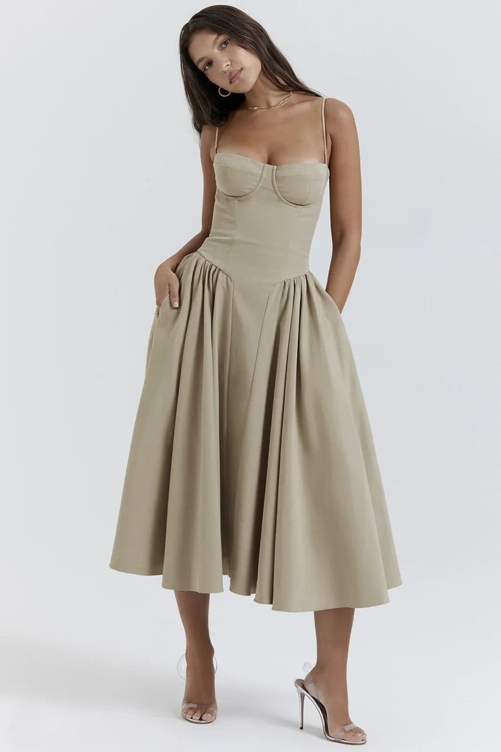 Luxurious women's sleeveless midi dress with a corset, designed for elegance at galas and parties.