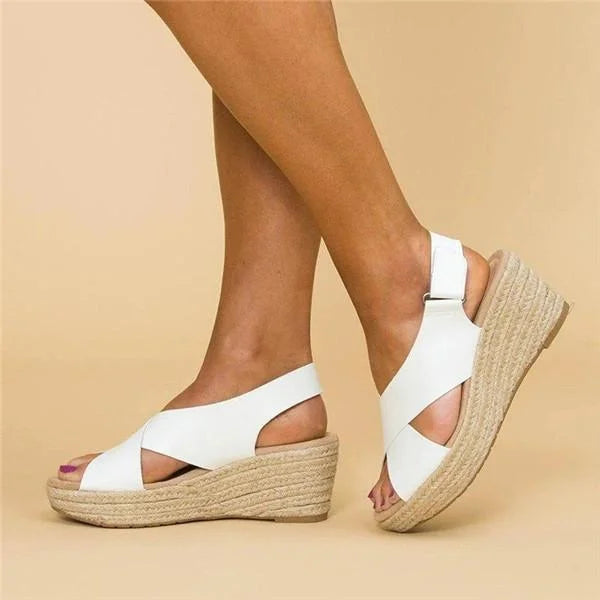 Stylish women's espadrille wedge shoes, perfect slip-on for casual elegant summer comfort.