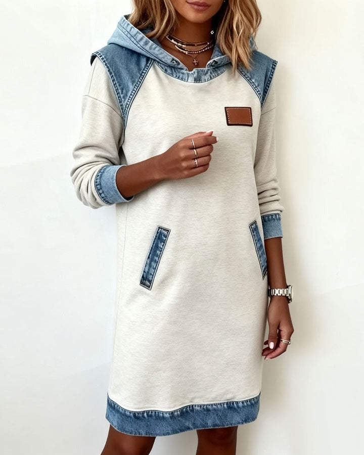 Simple and stylish women's hooded dress, ideal for comfortable, modern casual wear & versatile fashion.