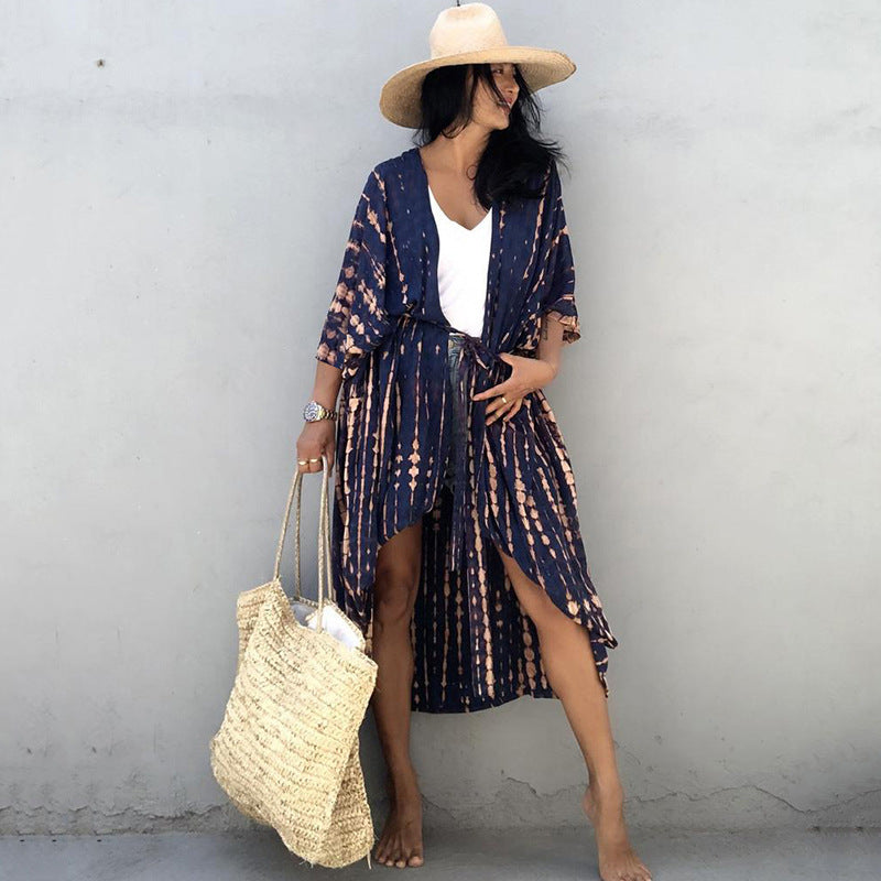 Stylish women's resort wear, glamorous sun protection beach cover up for an elegant look.