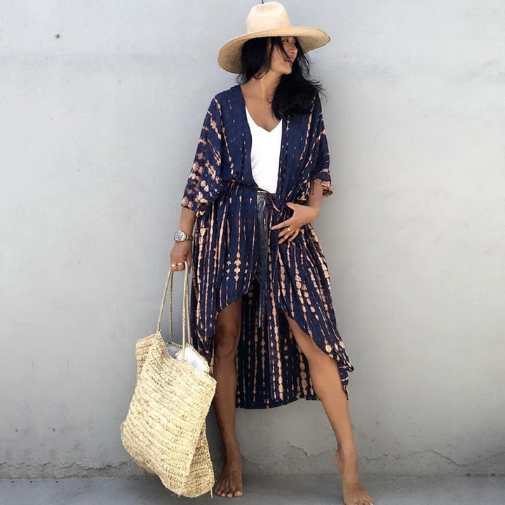 Stylish women's resort wear, glamorous sun protection beach cover up for an elegant look.