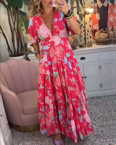 Plus size V-neck maxi dress for women, designed for comfort with flowy fabric and useful pockets.