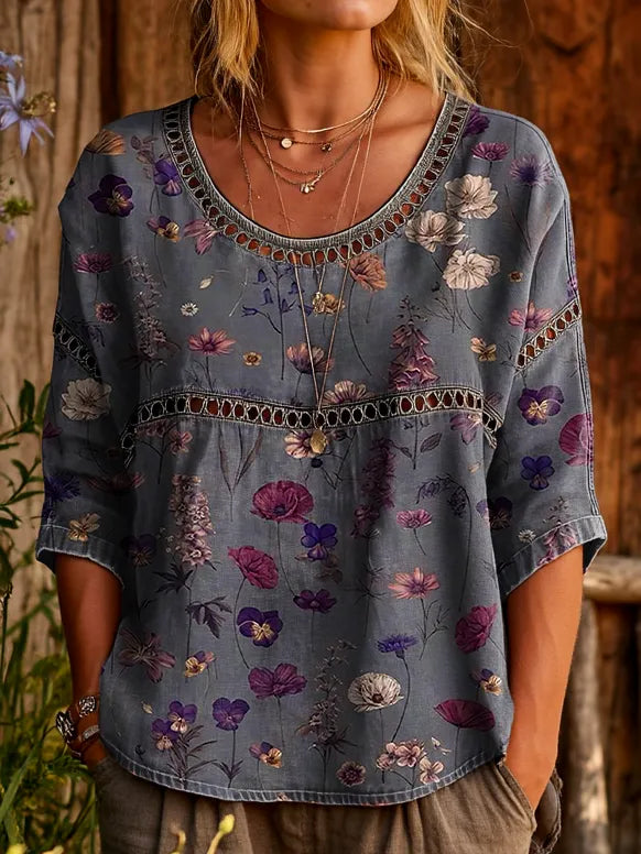 Stylish everyday women's relaxed fit top with beautiful colorful embroidery, offering casual comfort.
