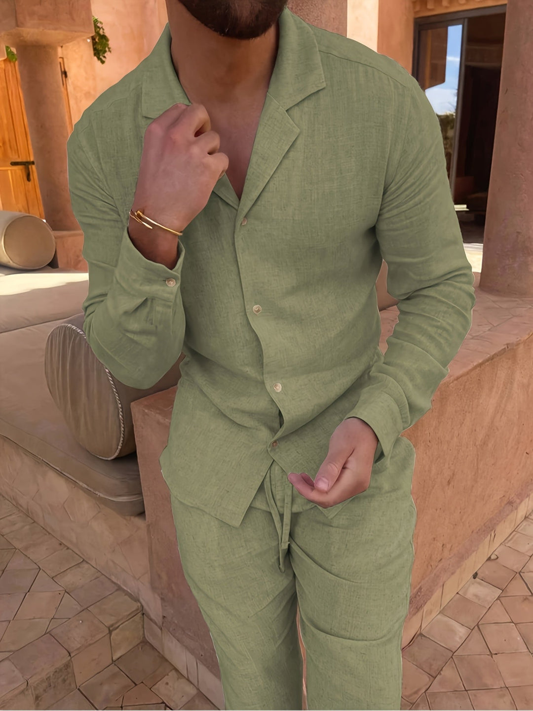 Black men's linen blend two-piece set, exuding comfort, class, and sophisticated minimalist fashion.