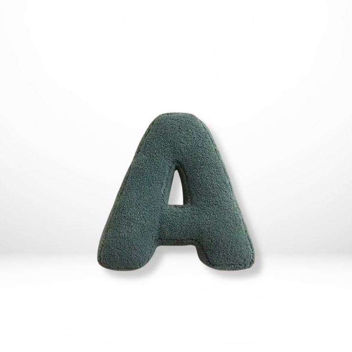 Soft velvet alphabet 'A' cushion, ideal for stylish living room decor & personalized home accents.