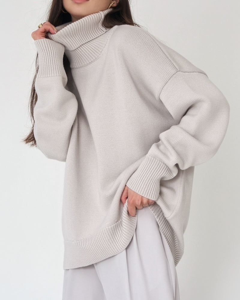 Chic women's oversized jumper, a cozy roll neck sweater for ultimate comfort & style.