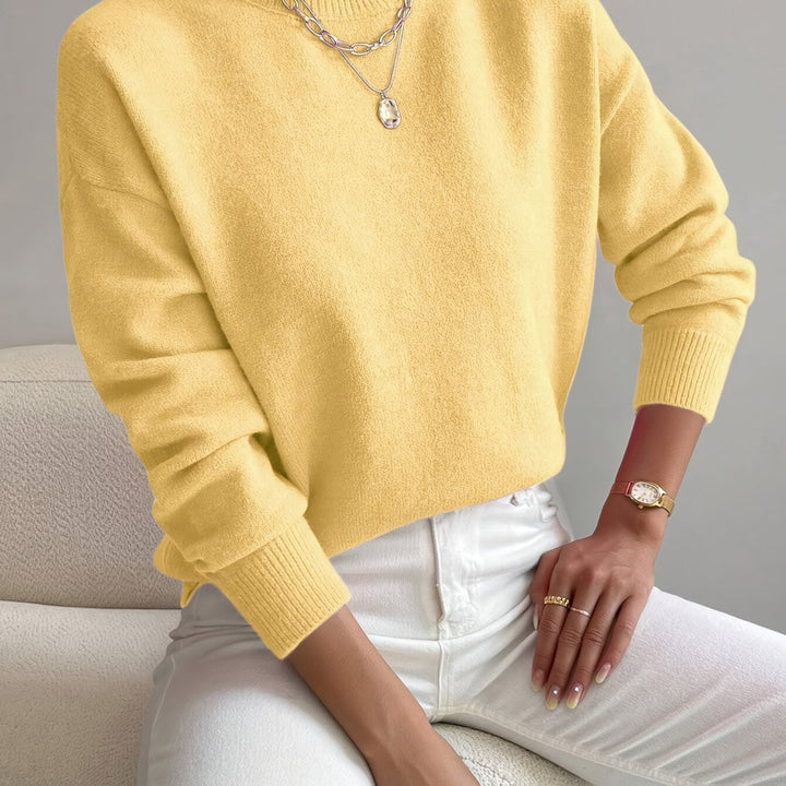 Elegant women's knitted high neck pullover, suitable for autumn/winter.