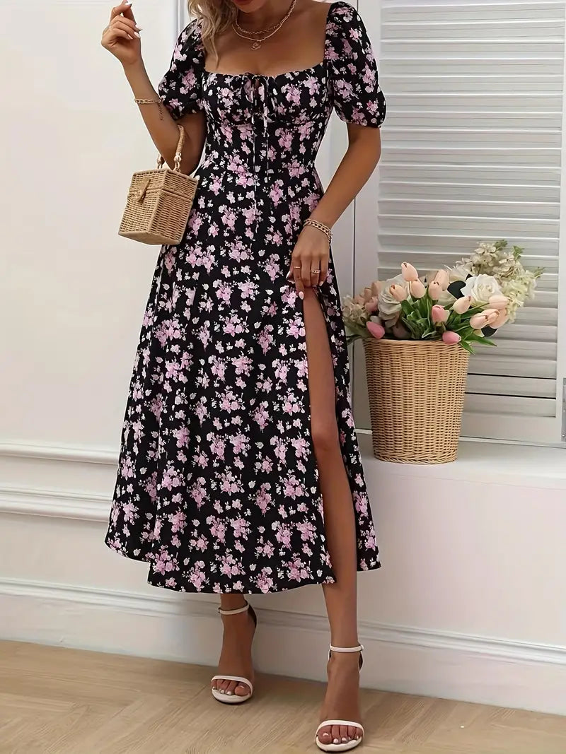 Elegant women's floral dress with stylish puff sleeves & A-line cut, ideal for summer events.