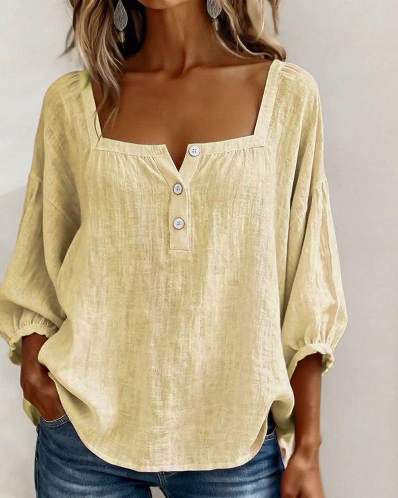 Comfortable women's top with puff sleeves, relaxed fit, and a stylish square neck.