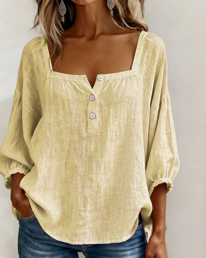Comfortable women's top with puff sleeves, relaxed fit, and a stylish square neck.