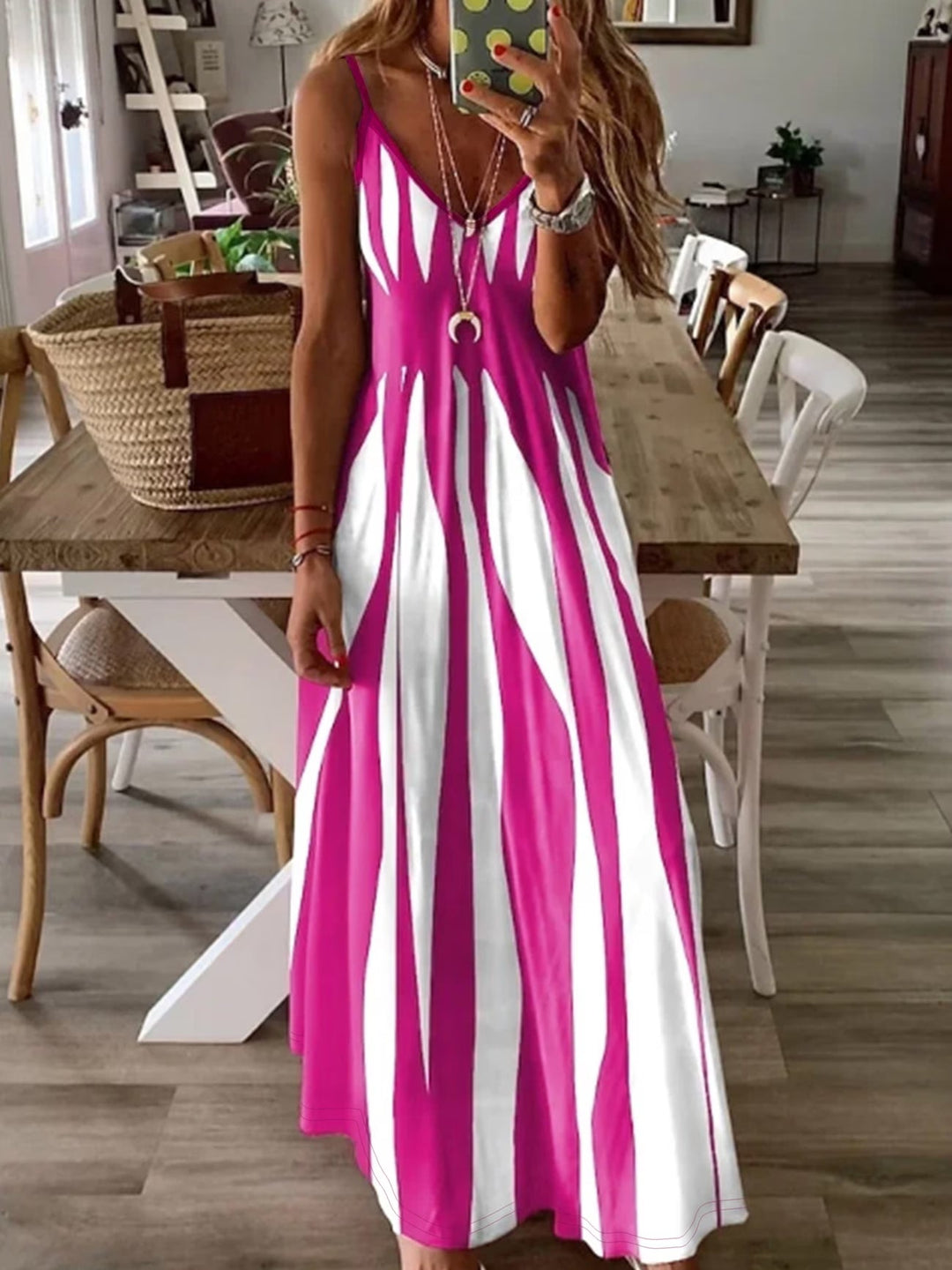 Versatile pink V-neck dress for women, with delicate thin straps & an elegant flowing silhouette. Great for summer.