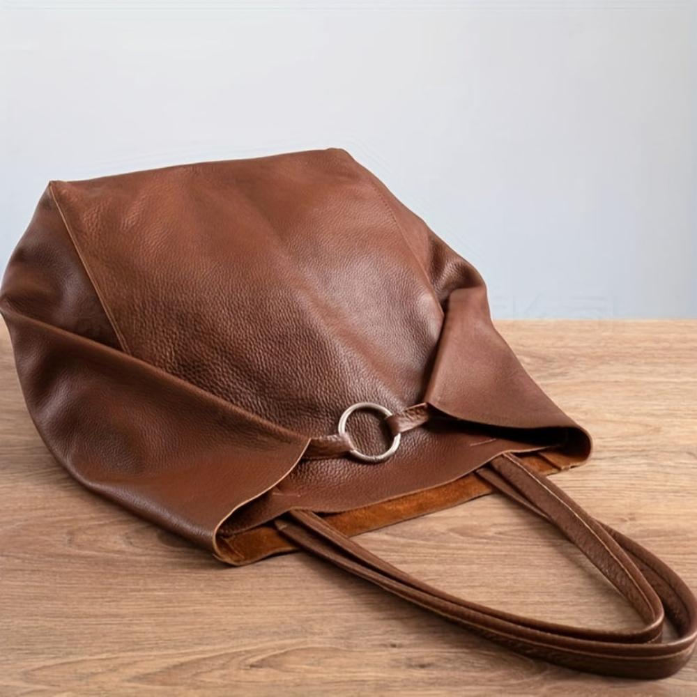 Large capacity women's retro tote bag in PU leather, perfect as a stylish shoulder handbag.