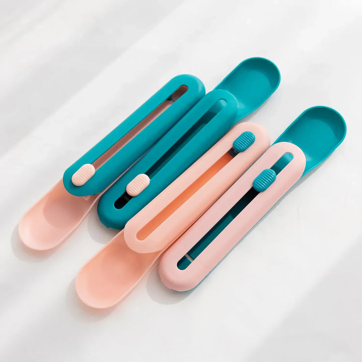 Pet food dispenser spoon with slider for easy and hygienic feeding of wet cat or dog food from tubes.
