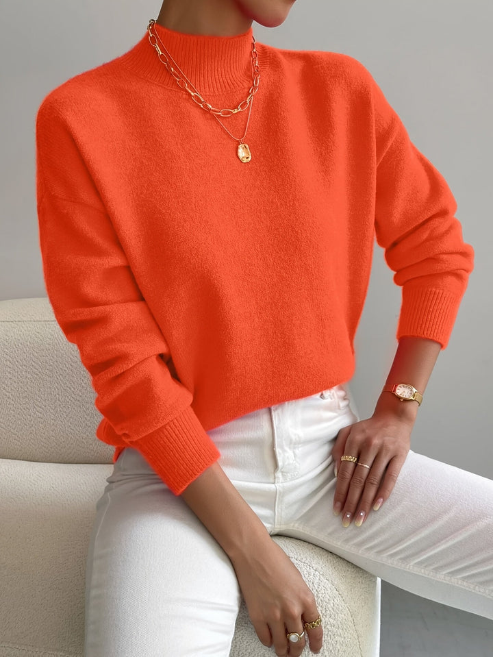 Stylish knitted high neck jumper, perfect for layering in autumn winter.