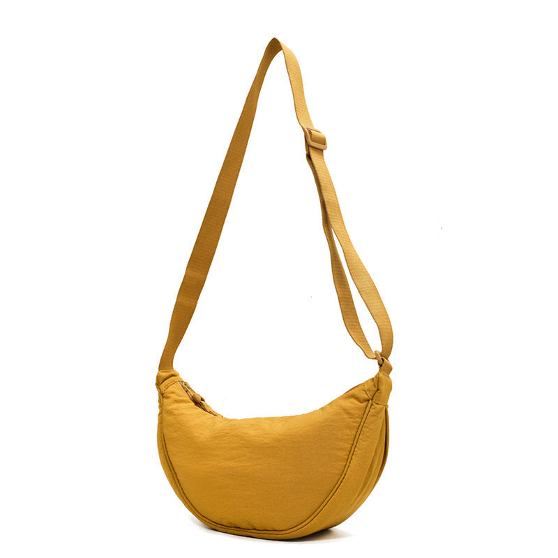 Trendy Half Moon Crossbody Bag, women's stylish accessory for modern, on-the-go living.