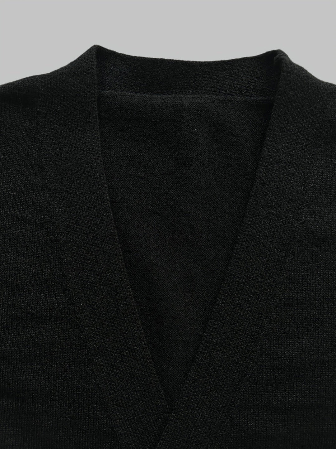 Warm men's handcrafted button cardigan. Regular fit, long sleeve, perfect for cold weather comfort.