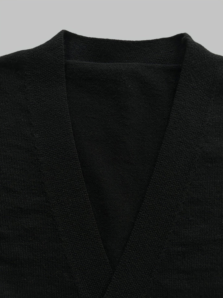 Warm men's handcrafted button cardigan. Regular fit, long sleeve, perfect for cold weather comfort.
