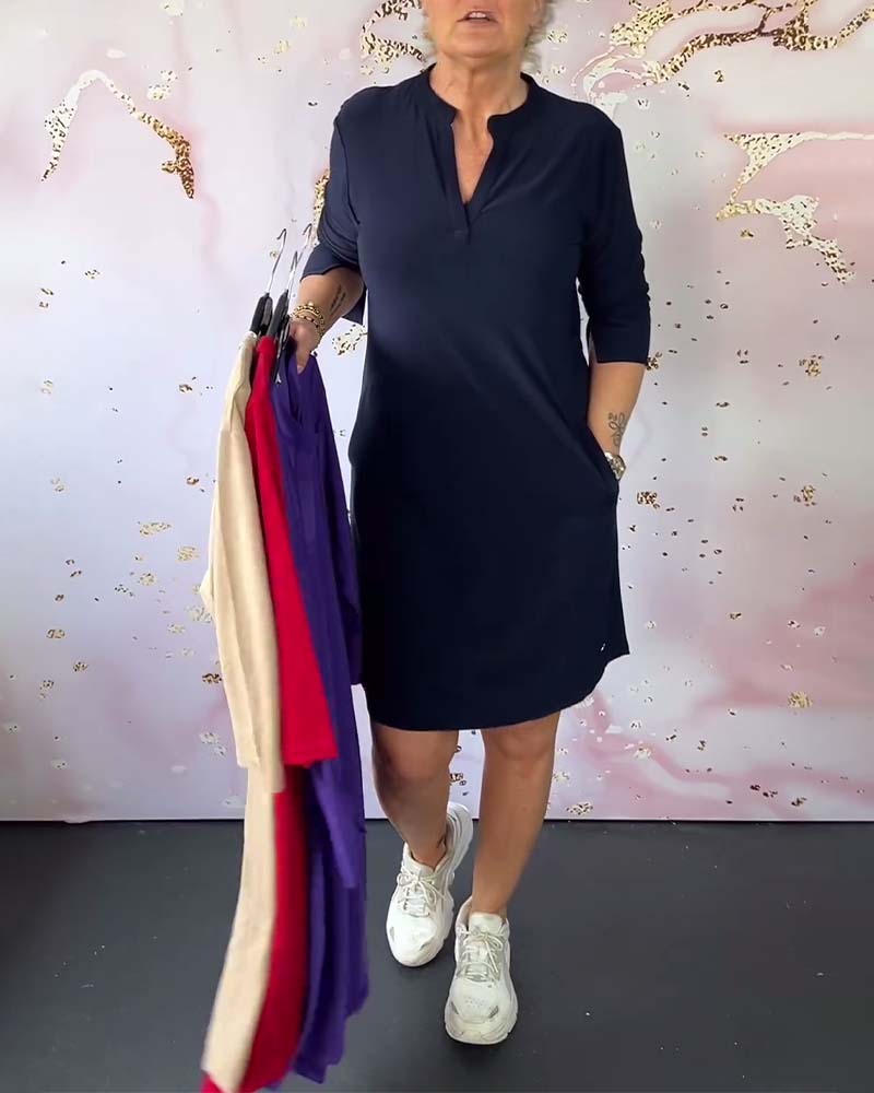 Elegant V-neck midi dress for women, offering versatile style from daytime to evening.
