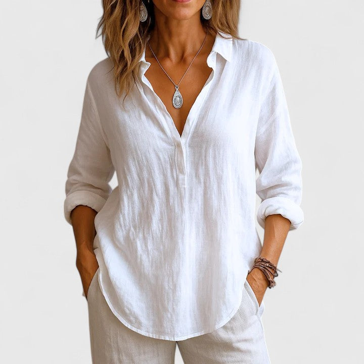 Stylish women's long-sleeve flowy top. Versatile & comfortable for everyday wear or summer fashion.