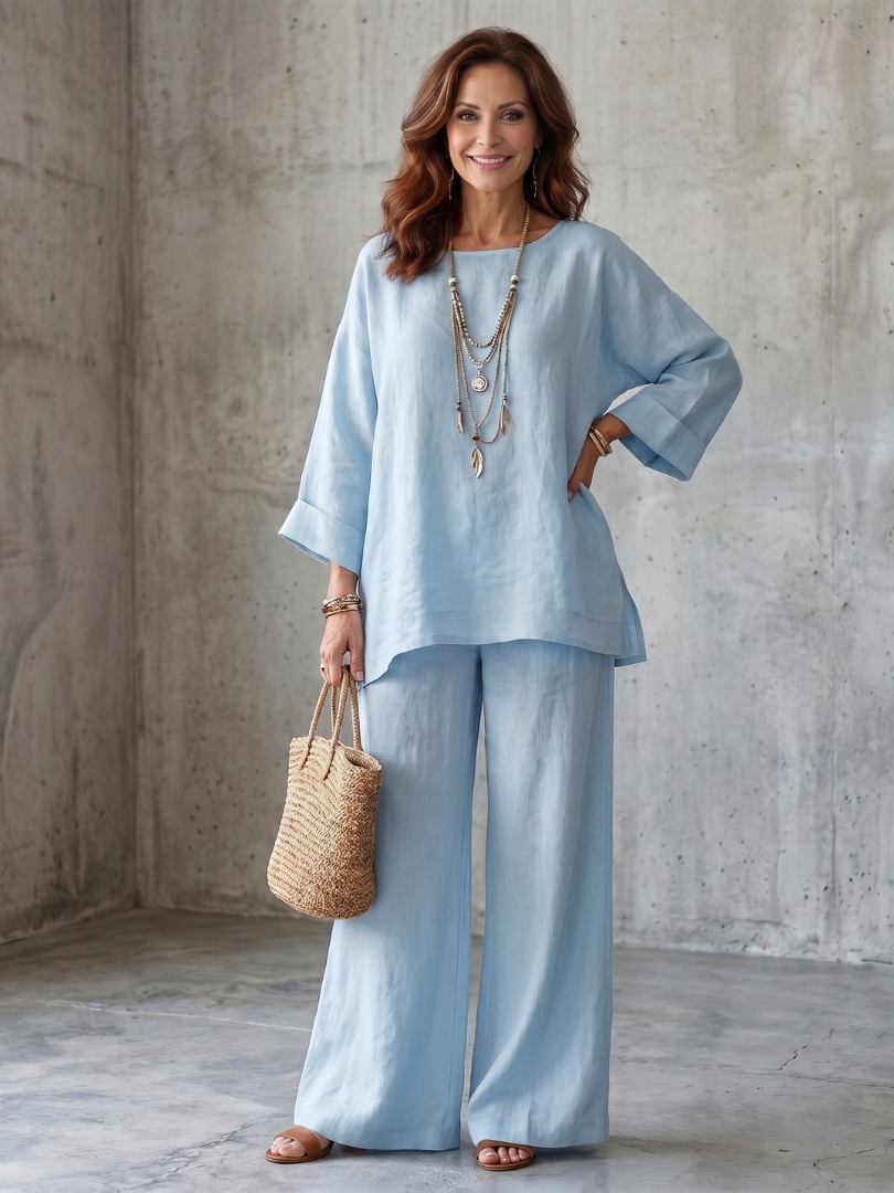 Relaxed fit women's oversized tunic & wide leg pant set, a stylish two-piece for comfort & versatility.