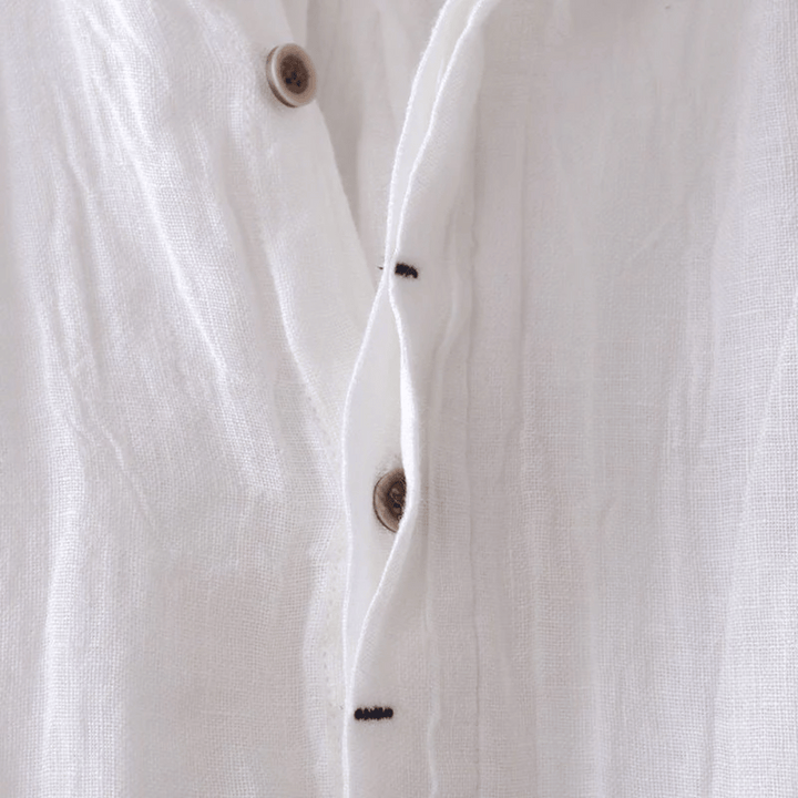 Stylish women's short-sleeve tailored shirt, a comfortable summer top & versatile wardrobe essential.