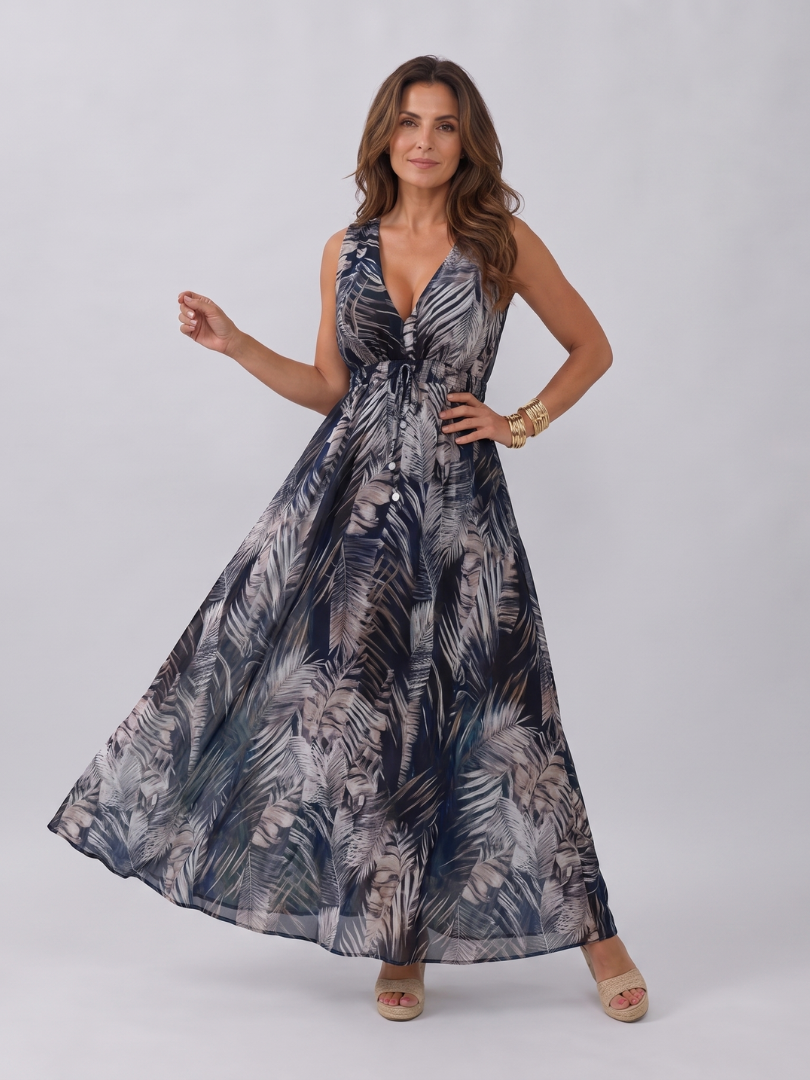 Effortless women's empire waist midi dress, sleeveless, tropical print, a must-have for summer and resort wear.